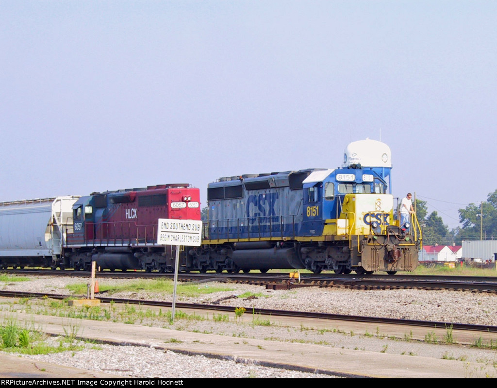 CSX 8151 leads a train into the yard